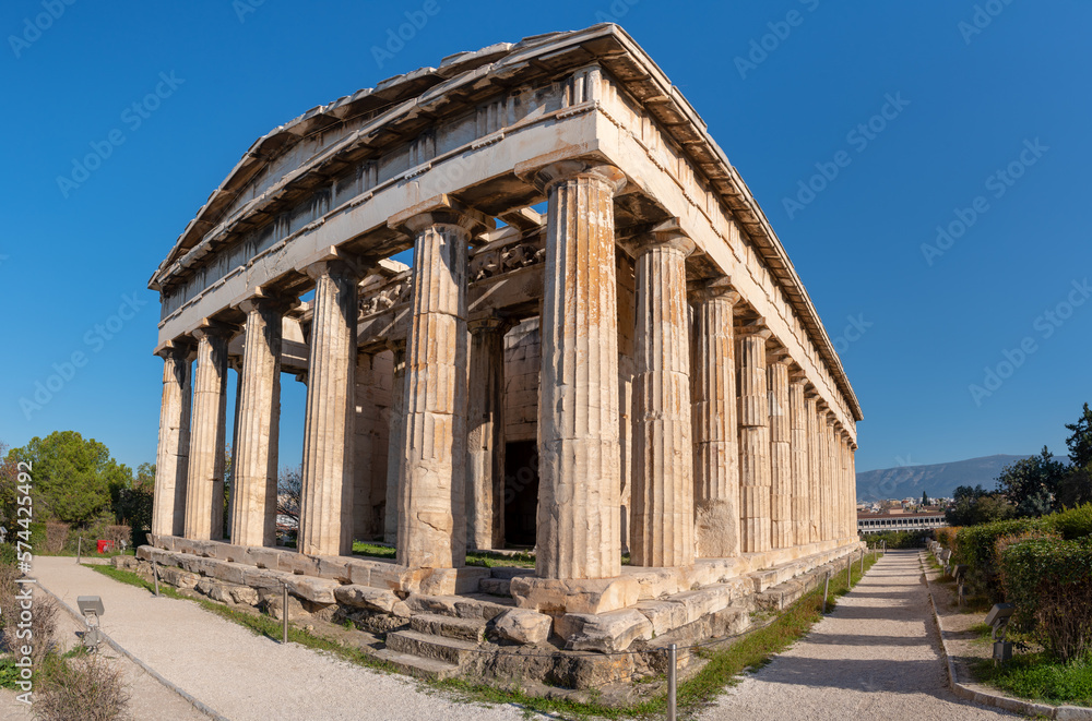 The Temple of Hephaestus in ancient market (agora) under the rock of Acropolis, Athens, Greece.