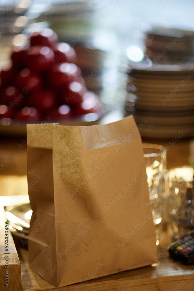 Unpacking paper bag food delivery from restaurant. Chinese food online