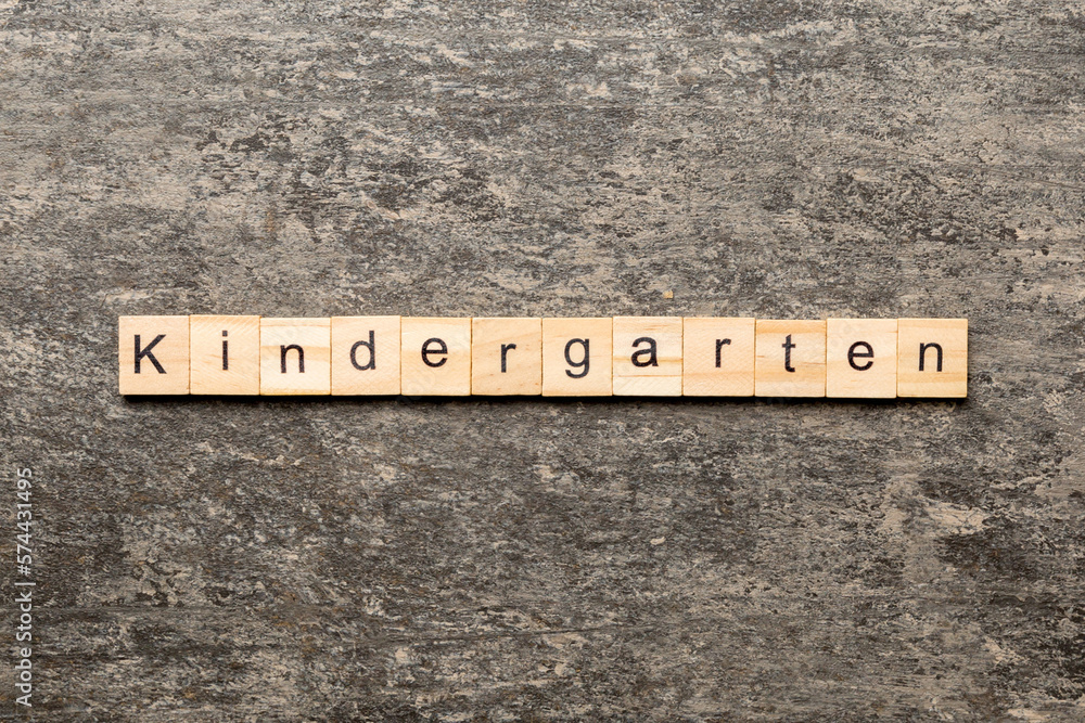 kindergarten word written on wood block. kindergarten text on table, concept kindergarten word written on wood block. kindergarten text on table, concept