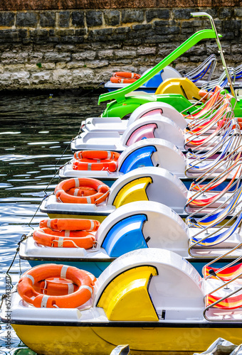 typical new pedal boat at a port photo