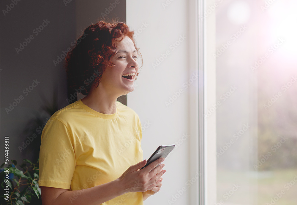 Smiling young woman blogger subscribing new social media, buying in internet, ordering products online in apps. Smiling young woman blogger subscribing new social media, buying in internet, ordering products online in apps.