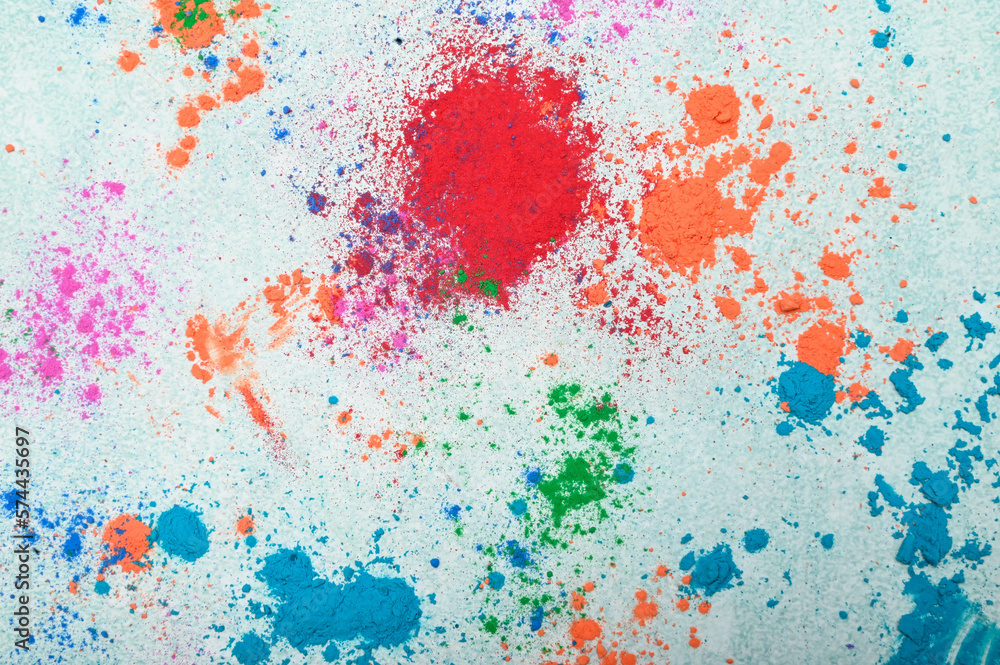top view of colorful traditional holi powder in bowls isolated on dark background.Space for text . happy holi.Concept Indian color festival called Holi top view of colorful traditional holi powder in bowls isolated on dark background.Space for text . happy holi.Concept Indian color festival called Holi