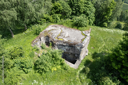 A drone view of a concrete blockhouse of the former czechoslovak fortification in Orlicke hory. Mladkov, Eastern Bohemia, Czechia photo