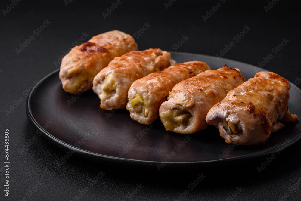Delicious baked pork or chicken roll with mushrooms, spices and herbs inside Delicious baked pork or chicken roll with mushrooms, spices and herbs inside