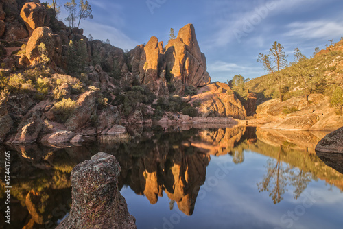 Pinnacles National Park Rock Formations Reflected in Bear Gulch Reservoir During Golden Hour photo