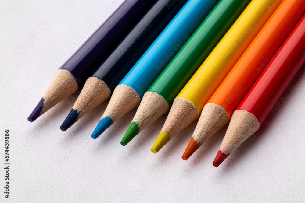 Bright сolored pencils on a white paper background. Blots. Rainbow. Close up. Macro. Bright сolored pencils on a white paper background. Blots. Rainbow. Close up. Macro.