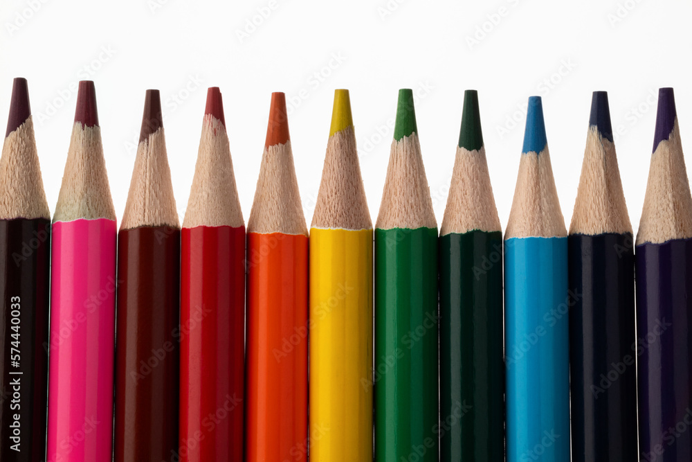 Bright сolored pencils on a white paper background. Blots. Rainbow. Close up. Macro. Bright сolored pencils on a white paper background. Blots. Rainbow. Close up. Macro.