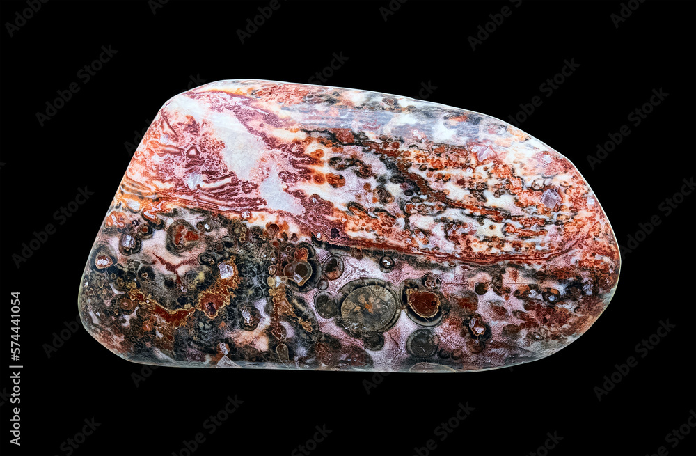 Photo of a Polished, Natural Stone Jasper in A Colorful Red-Brown Hue. Isolated On Black Background Photo of a Polished, Natural Stone Jasper in A Colorful Red-Brown Hue. Isolated On Black Background