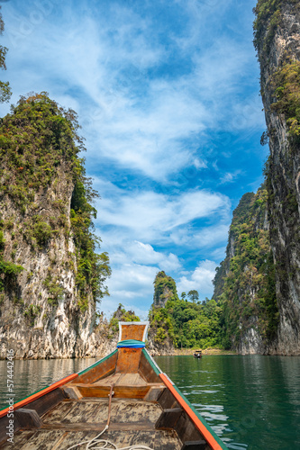 Boat view of epic limestone cliffs at Cheow Lan lake, Khao Sok National Park, Suratthani, Thailand