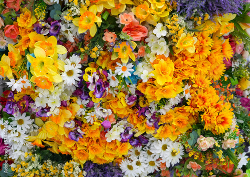 Fototapeta Naklejka Na Ścianę i Meble -  colorful artificial spring flower as background