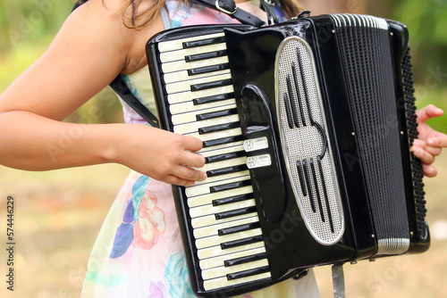 Bild auf Leinwand playing accordion, woman, accordion, squeezebox, musical instrument, bellows