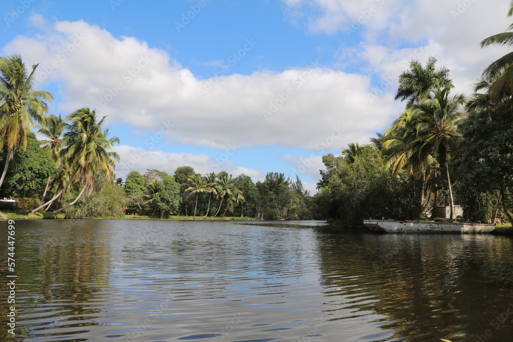Boat trip on a canal between marshland at Treasure Lake, Cuba Caribbean