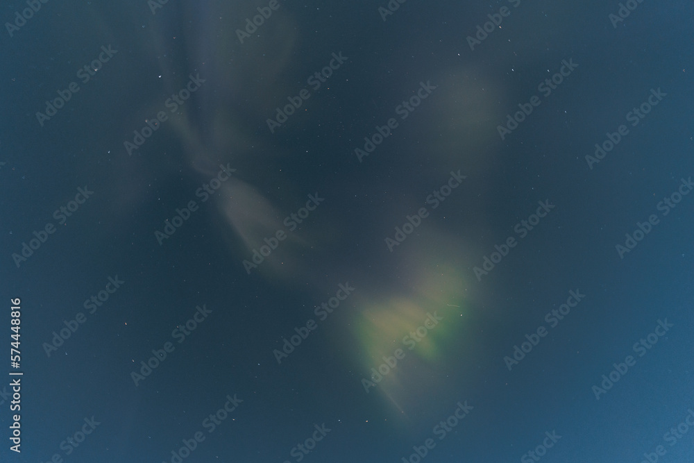 Northern lights / Aurora from below at night in Norway