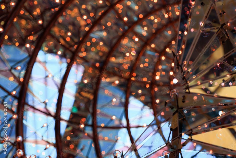 Blurred glass ball hanging from ceiling in Copenhagen Opera House