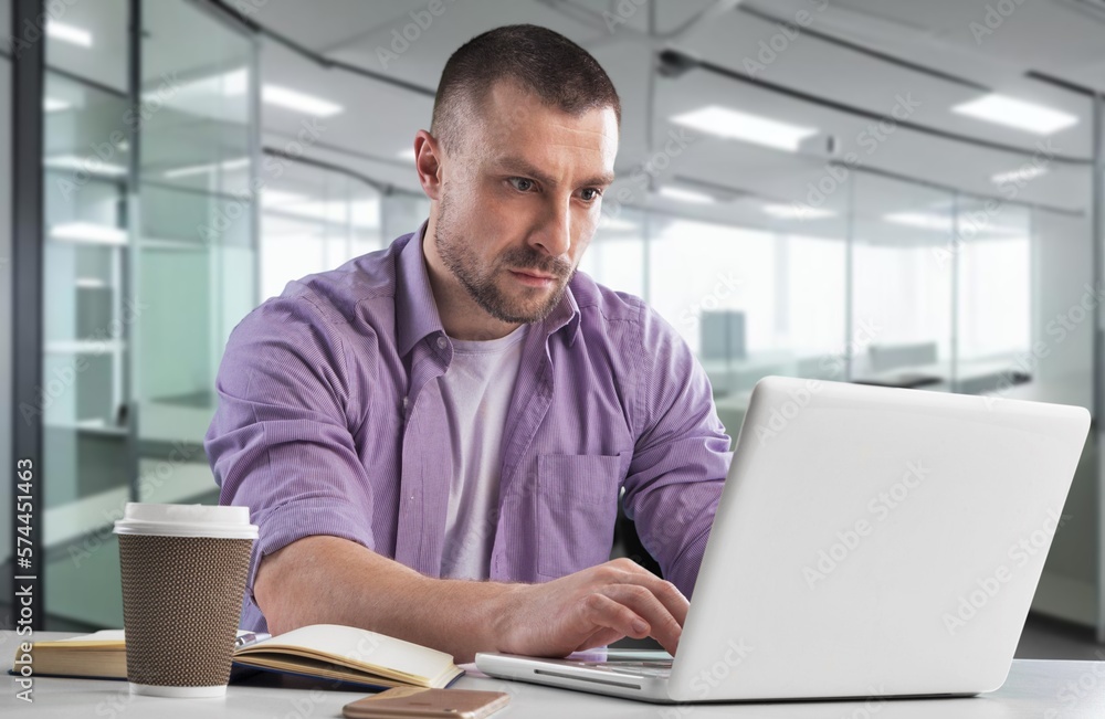 Busy Businessman Working in office on computer