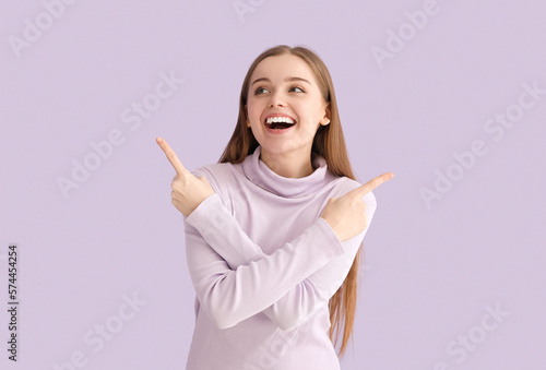 Happy young woman in sweate...