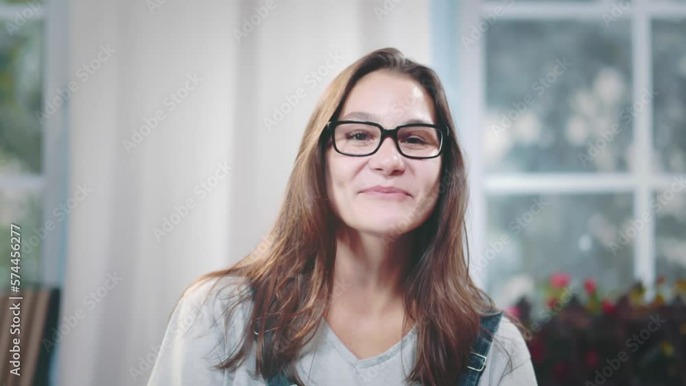 Happy young woman talking video calling looking at webcam. Realtime Happy young woman talking video calling looking at webcam. Realtime