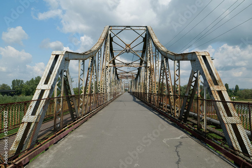 Old metal bridge across Dniester river in the city of Halych, western Ukraine