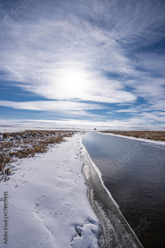 unfrozen canal in winter