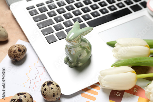 Laptop with Easter rabbit, ...