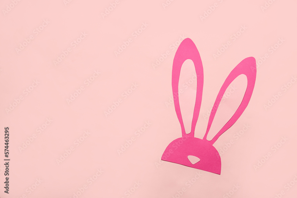 Paper bunny on pink background