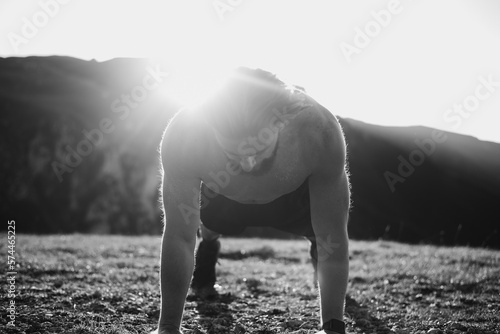 Athlete doing push-ups in the early morning. The concept of a healthy life