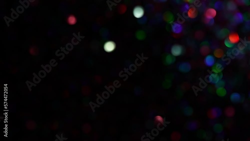 Small Blur Neon Lights transition. Bokeh Blur Circles Shimmering On Dark. Amazing Lens Flares Light Leaks and Bokeh Motion Effect. 4k animated background or overlay. Multicolored Blur Lights Glowing.