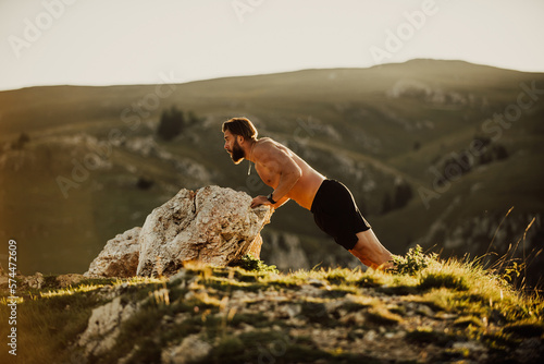 Athlete doing push-ups in the early morning. The concept of a healthy life