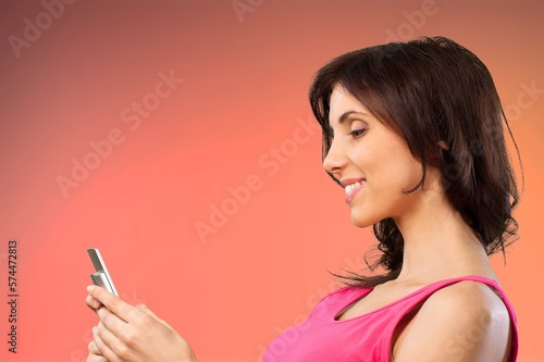 Cheerful young person using a phone