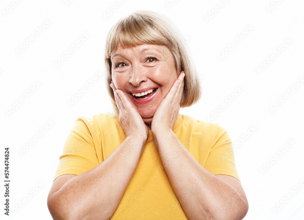 lifestyle, emotion and people concept: senior surprised woman. Isolated over white background. lifestyle, emotion and people concept: senior surprised woman. Isolated over white background.
