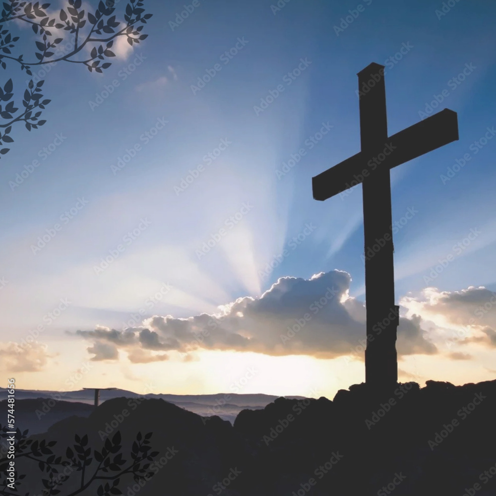 wooden cross with beautiful sky in the background and clouds in front of the beautiful sunset