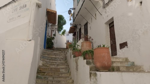 View Looking Up Stairs With Large Ceramic Planters Outside Entrances In Tangier, Morocco 