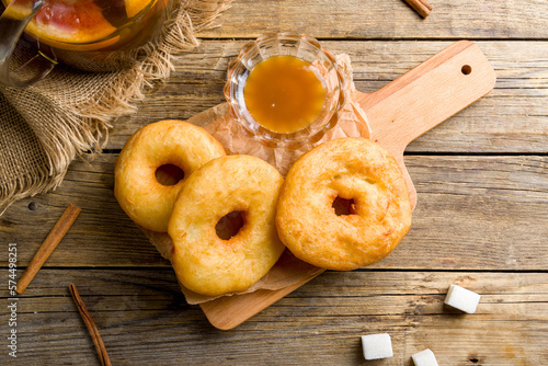 georgian donuts with cream on old wooden table top view photo