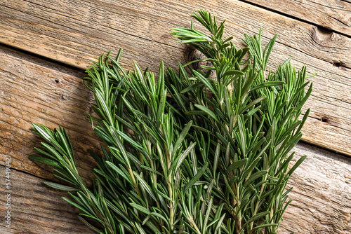 rosemary on old wooden table top view