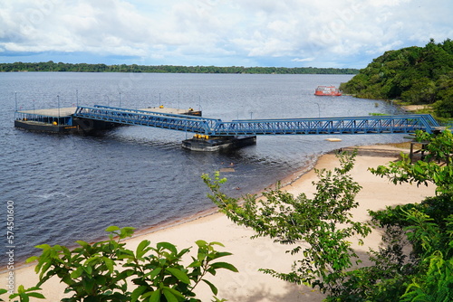 Harbor pontoon that equalizes the highly fluctuating water levels of the Rio Negro river. Porto of the small Amazon town of Novo Airao, Amazonas state, Brazil.
