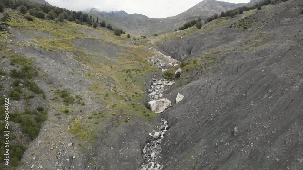 Drone video flying up Mountain gorge river canyon stream Gramos Greece Drone video flying up Mountain gorge river canyon stream Gramos Greece