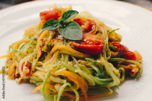 Sliced vegetable salad, zucchini, tomatoes and carrots