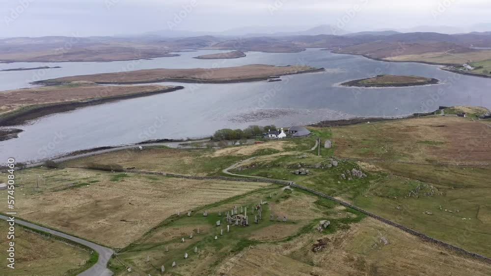 Point-of-interest drone shot of the Callanish Standing Stones. Filmed on the Isle of Lewis, part of the Outer Hebrides of Scotland. Point-of-interest drone shot of the Callanish Standing Stones. Filmed on the Isle of Lewis, part of the Outer Hebrides of Scotland.