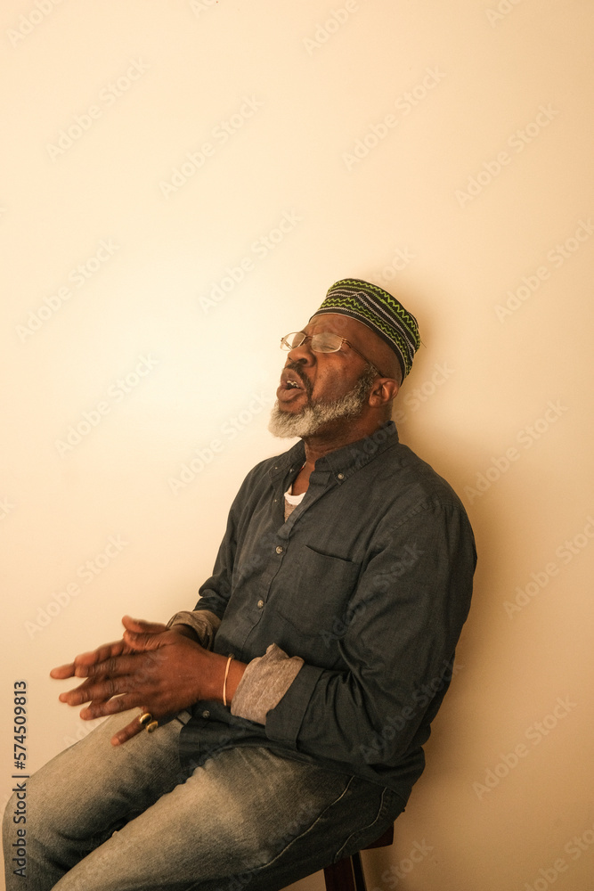 Man wearing african kufi Man wearing african kufi