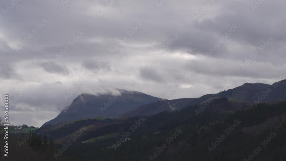 Landscape timelapse of Spanish nature, hills and cloudy day with fog or mist Landscape timelapse of Spanish nature, hills and cloudy day with fog or mist