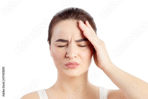 Woman has a headache or another pain. Close Up portrait white background