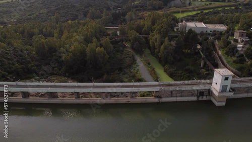 Wallpaper Mural Establisher aerial of Tratalias dam reveals industrial and natural panorama, day Torontodigital.ca