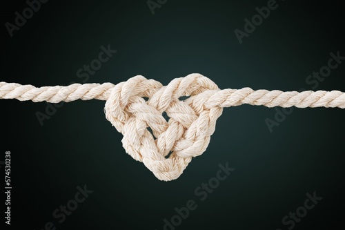 The rope knot in heart shape, strong love concept