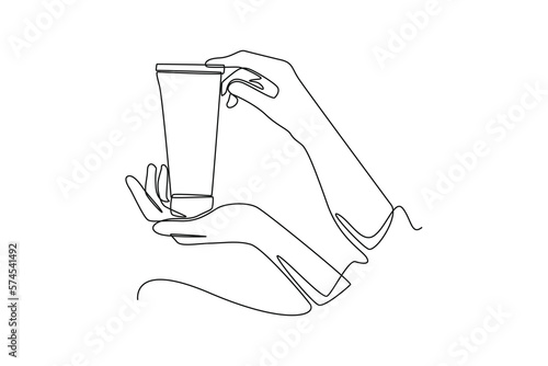 Continuous one line drawing hand holds skin care for facial care. Healthcare at home concept. Single line draw design vector graphic illustration.