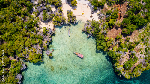 Discover the beauty of Zanzibar's hidden gems at Blue Safar Zanzibar, where you can explore the island's charming coves, enjoy a thrilling boat ride, and immerse yourself in the local culture with del photo