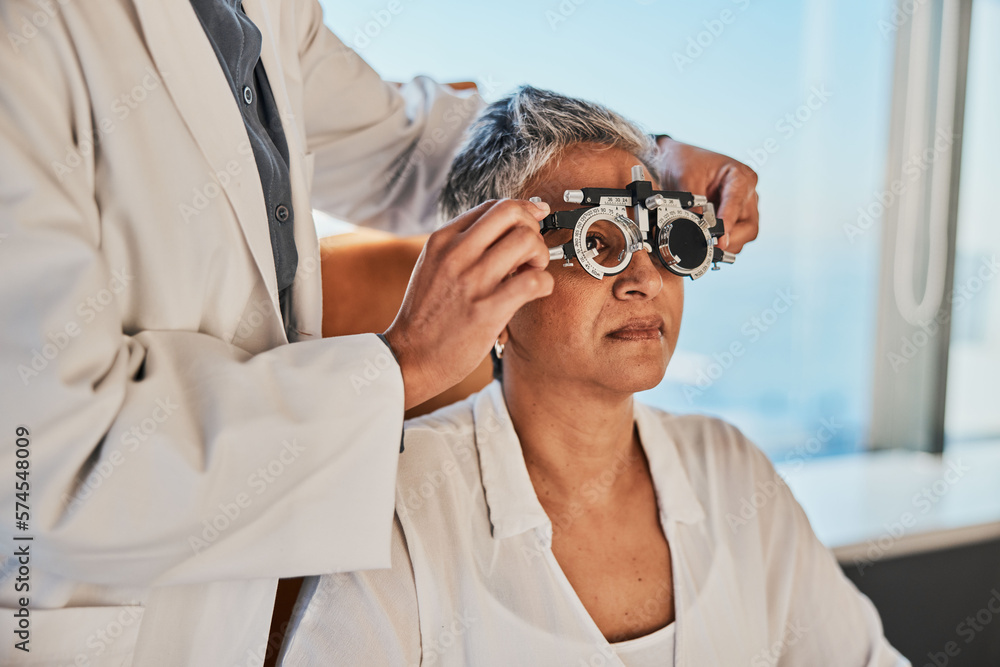 Senior woman, eye exam and medical eyes test of an elderly female at doctor  consultation. Vision, healthcare focus and old patient with consulting  wellness expert for lens and glasses support check Stock