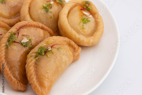 Chandrakala And Gujiya Mithai Also Called Suryakala, Gujia, Pirukiya, Pirukia, Pedakiya, Karanji, Basundi, Gughra Is Made Of Suji Ghee, Mawa Khoya Chasni Mava Khoa On Deepawali, Teez, Holi, Teej