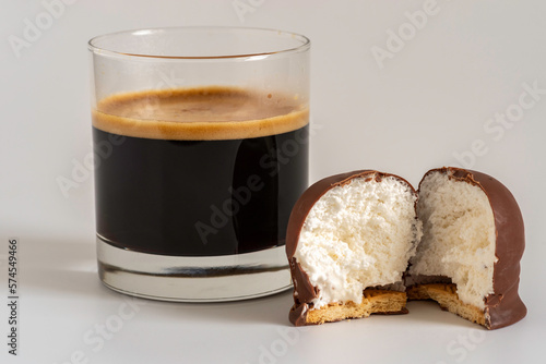 Israeli winter dessert Krembo (chocolate covered marshmallow and cookie) for coffee drinking. photo