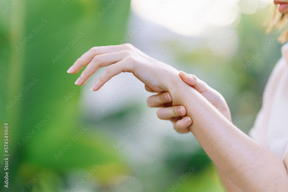 Woman having wrist pain due to carpal tunnel syndrome. Health care concept. Woman having wrist pain due to carpal tunnel syndrome. Health care concept.