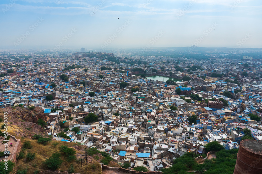 Obraz premium Beautiful top view of Jodhpur city from Mehrangarh fort, Rajasthan, India. Jodhpur is called Blue city since Hindu Brahmis there worship Lord Shiva, whose colour is blue, they painted houses in blue.